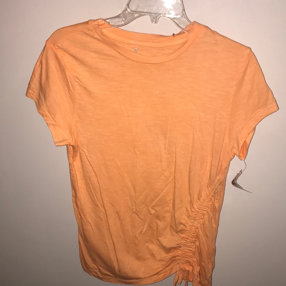 T-shirt by hippie laundry. Size small